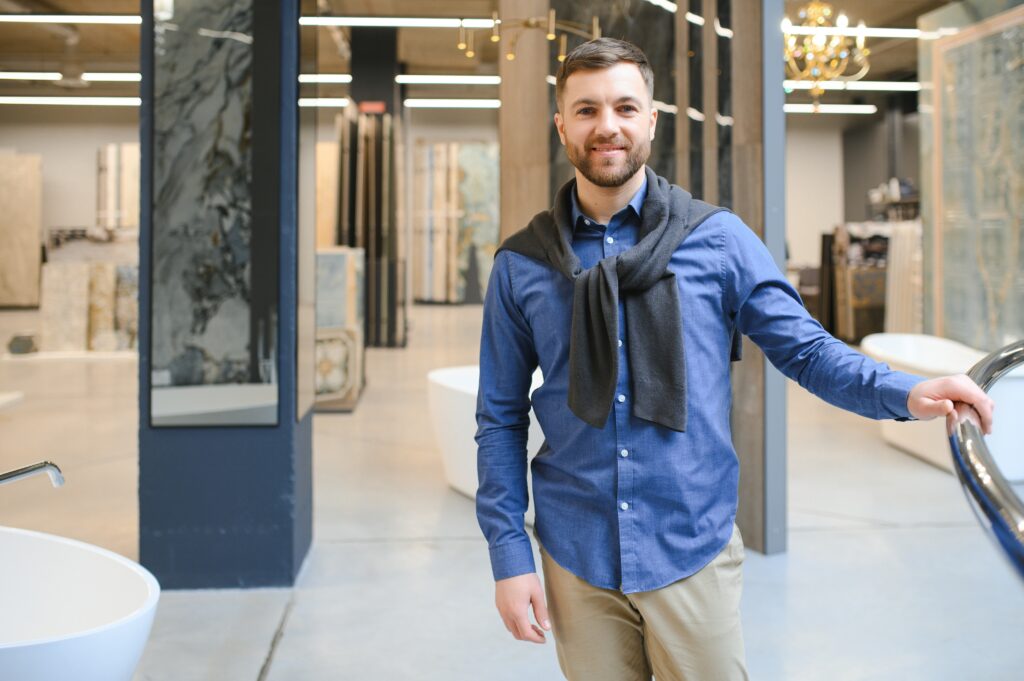 A man is looking for materials for renovation at the showroom