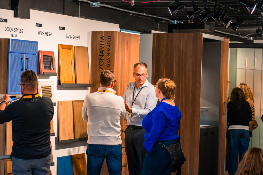 People in the showroom are talking