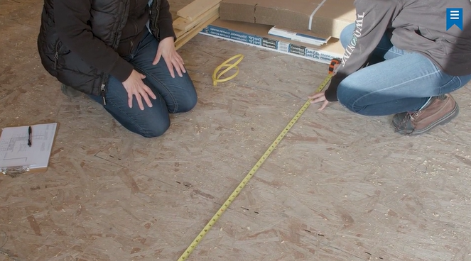 measuring the island cabinets for a site measure for custom kitchen design